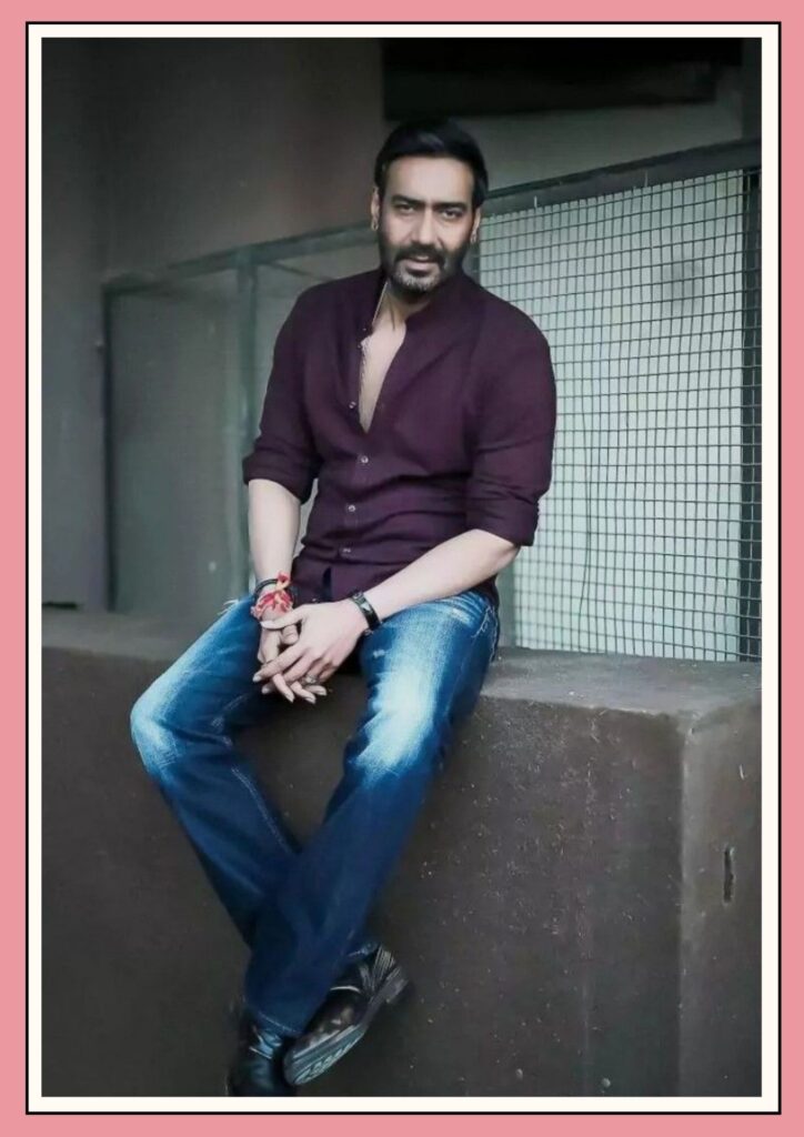 ajay devgn in brown shirt and jean with black sneakers