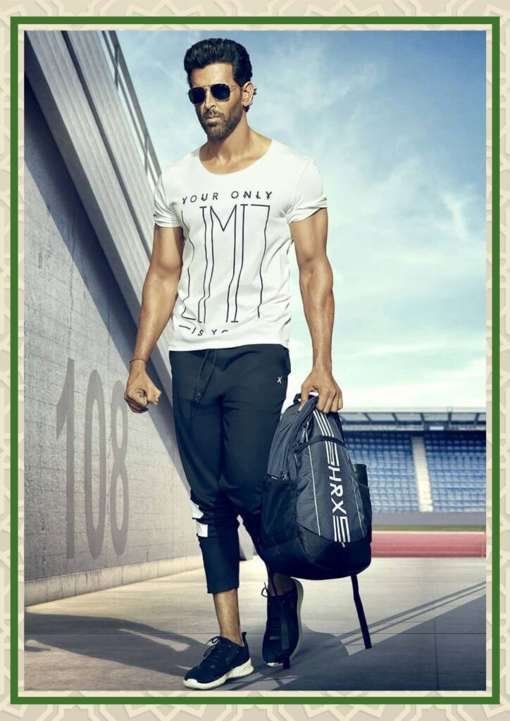 hrithik roshan in casual wear styled with tshirt and pant paired with sneakers and bag